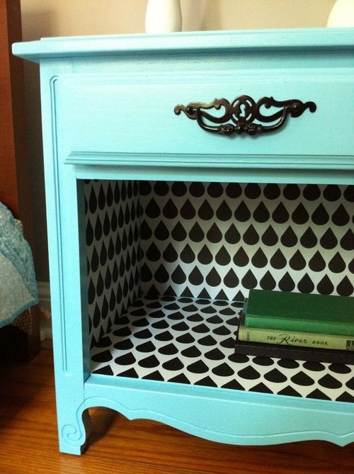 Photo via http://followpics.net/take-out-the-bottom-drawer-and-wallpaper-the-inside-i-love-the-way-this-looks/