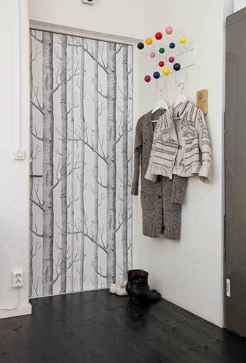 Photo via http://www.shelterness.com/10-cool-ideas-to-decorate-your-doors-with-wallpapers/